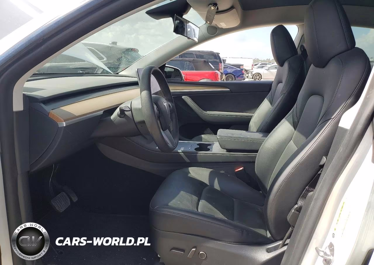 2023 Tesla Model Y VIN:7SAYGDEE6PA124621 - 7