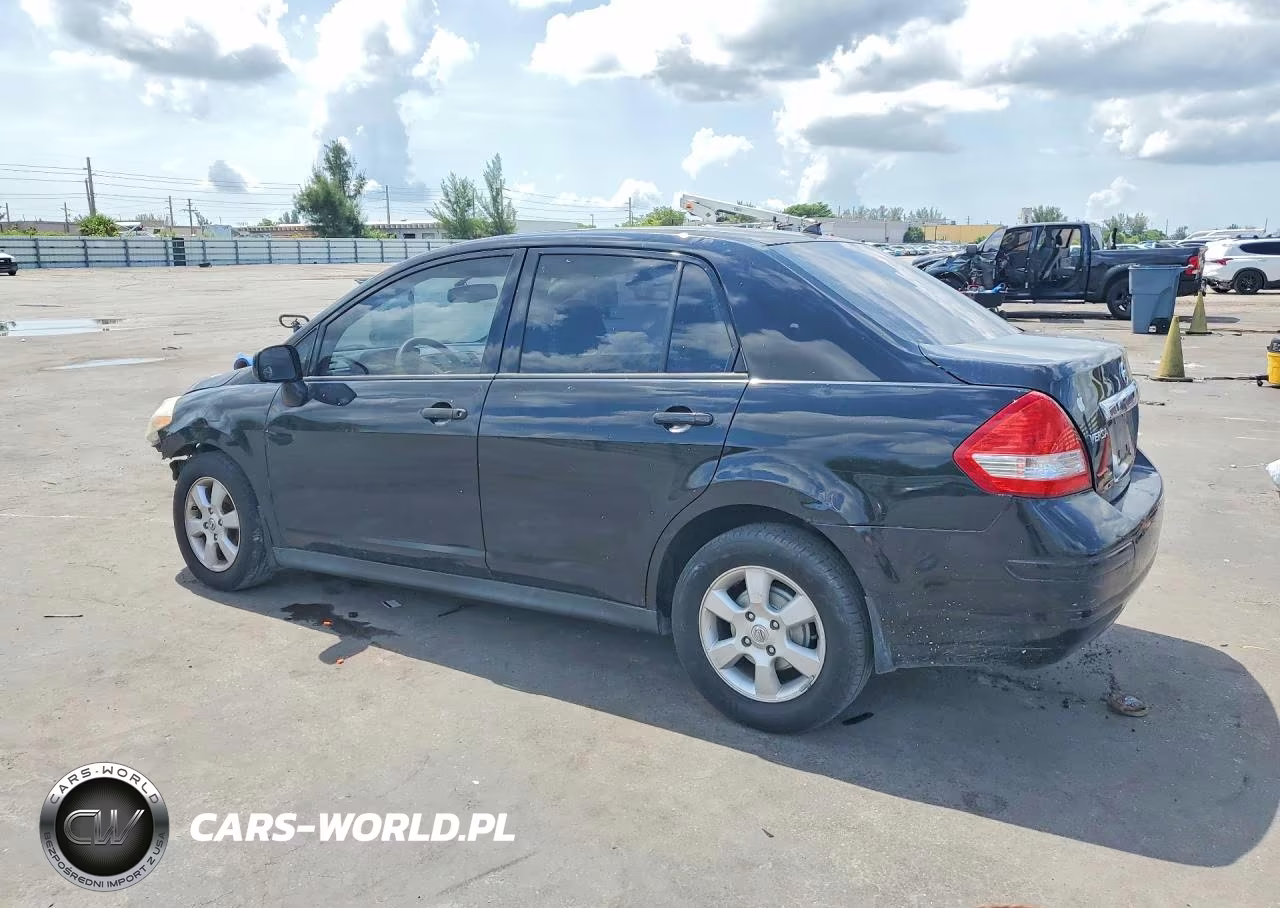 2009 Nissan Versa 1.8 S VIN:3N1BC11E99L439703 - 2