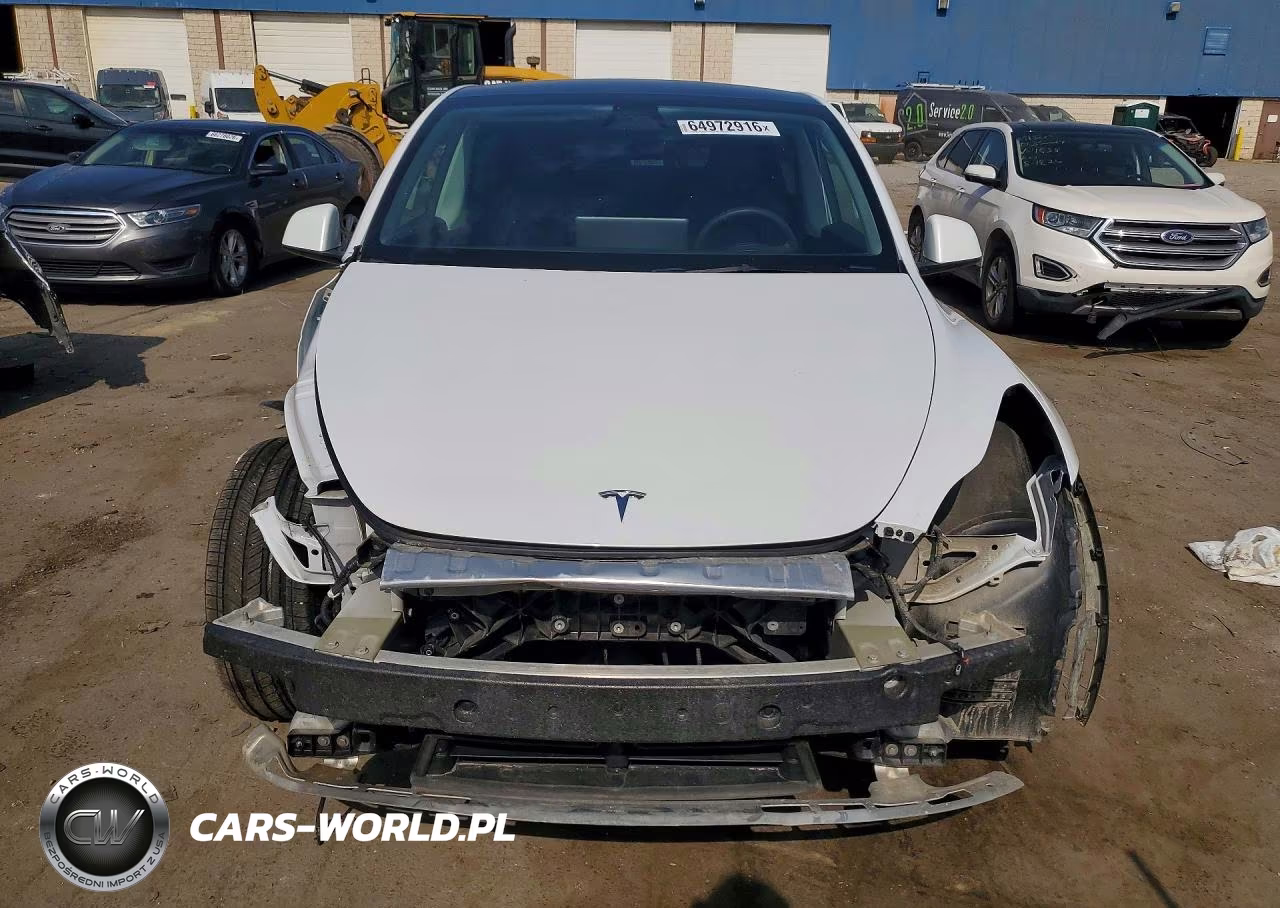 2024 Tesla Model Y VIN:7SAYGDEE9RF129057 - 5