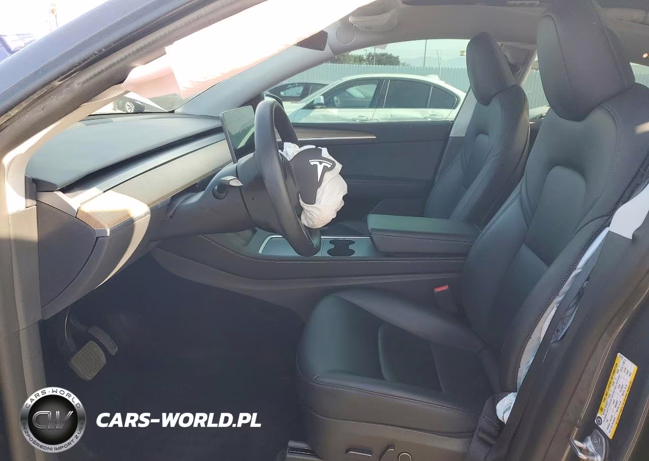 2023 Tesla Model Y VIN:7SAYGDEE6PA027337 - 7