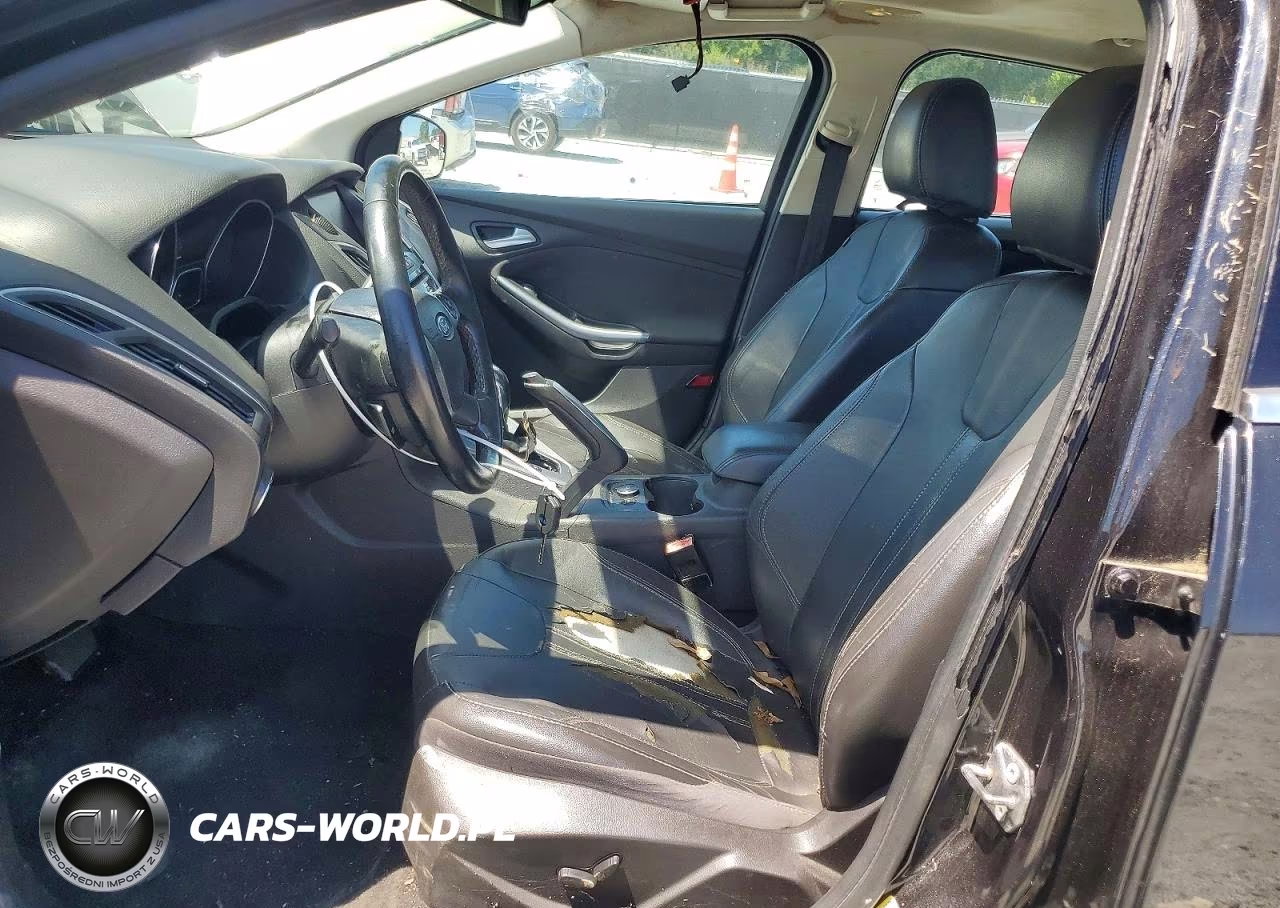 2012 Ford Focus Titanium VIN:1FAHP3J29CL420736 - 7