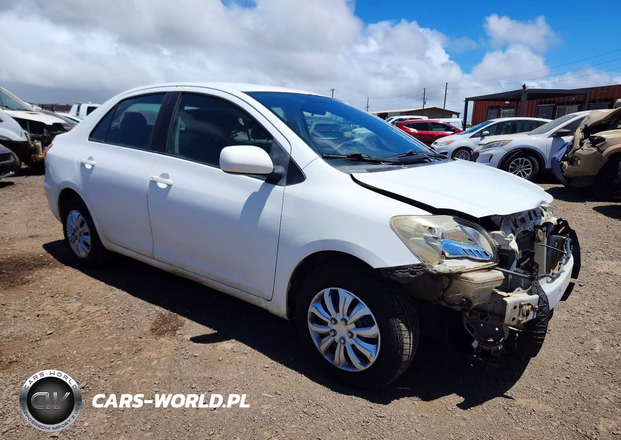 2011 Toyota Yaris Base VIN:JTDBT4K30B1400457 - 4