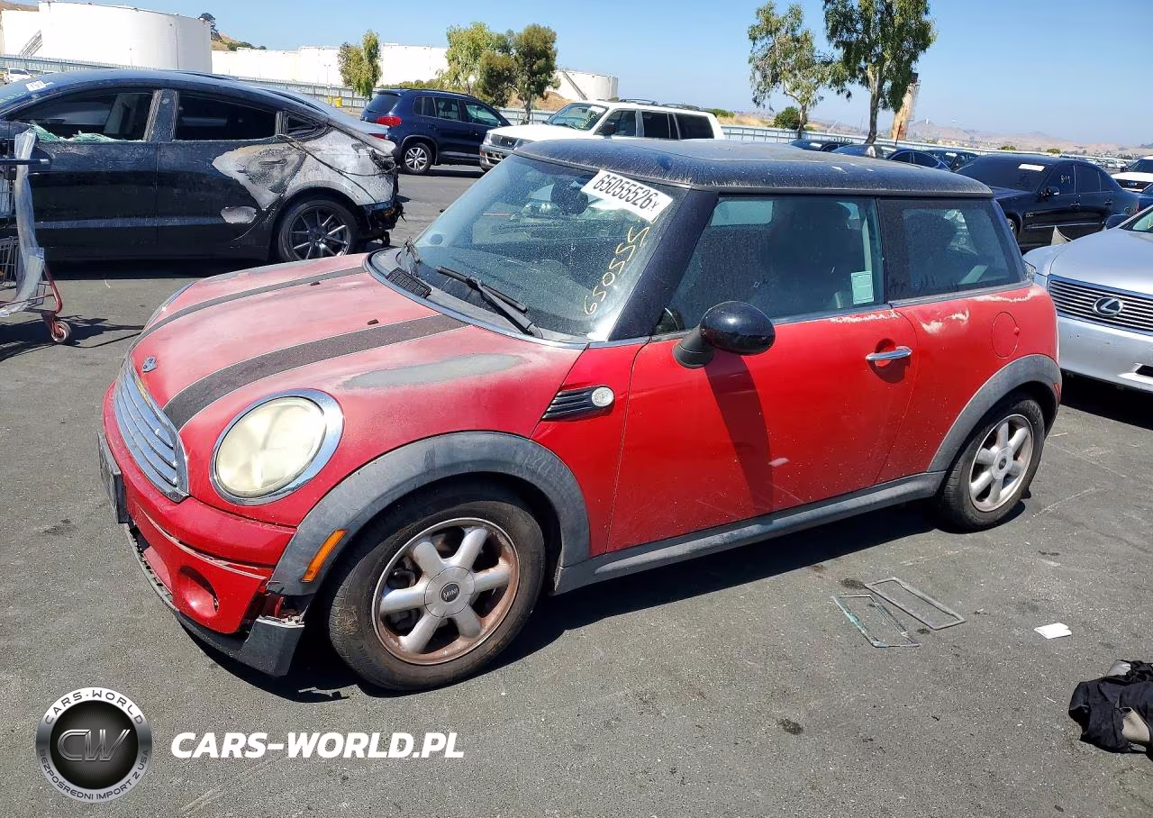 2009 Mini Cooper VIN:WMWMF33569TW79337 - 1