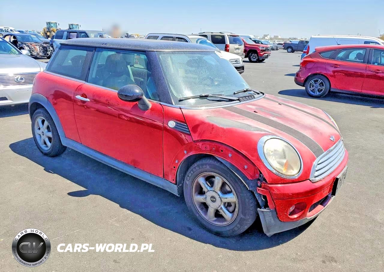 2009 Mini Cooper VIN:WMWMF33569TW79337 - 4