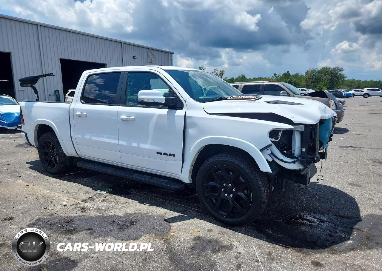2020 Ram 1500 Laramie VIN:1C6SRFJT7LN324944 - 4