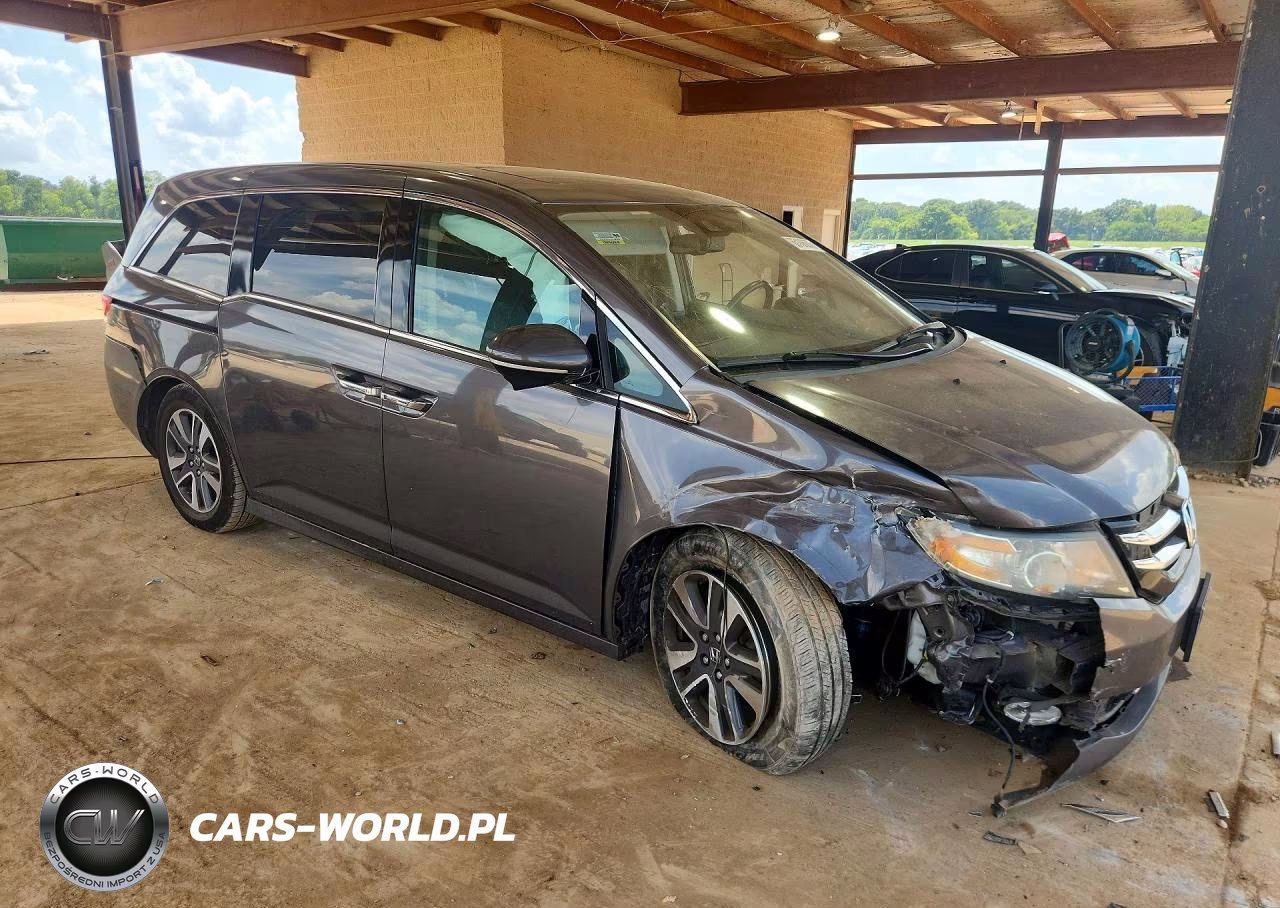 2016 Honda Odyssey Touring VIN:5FNRL5H91GB041649 - 4