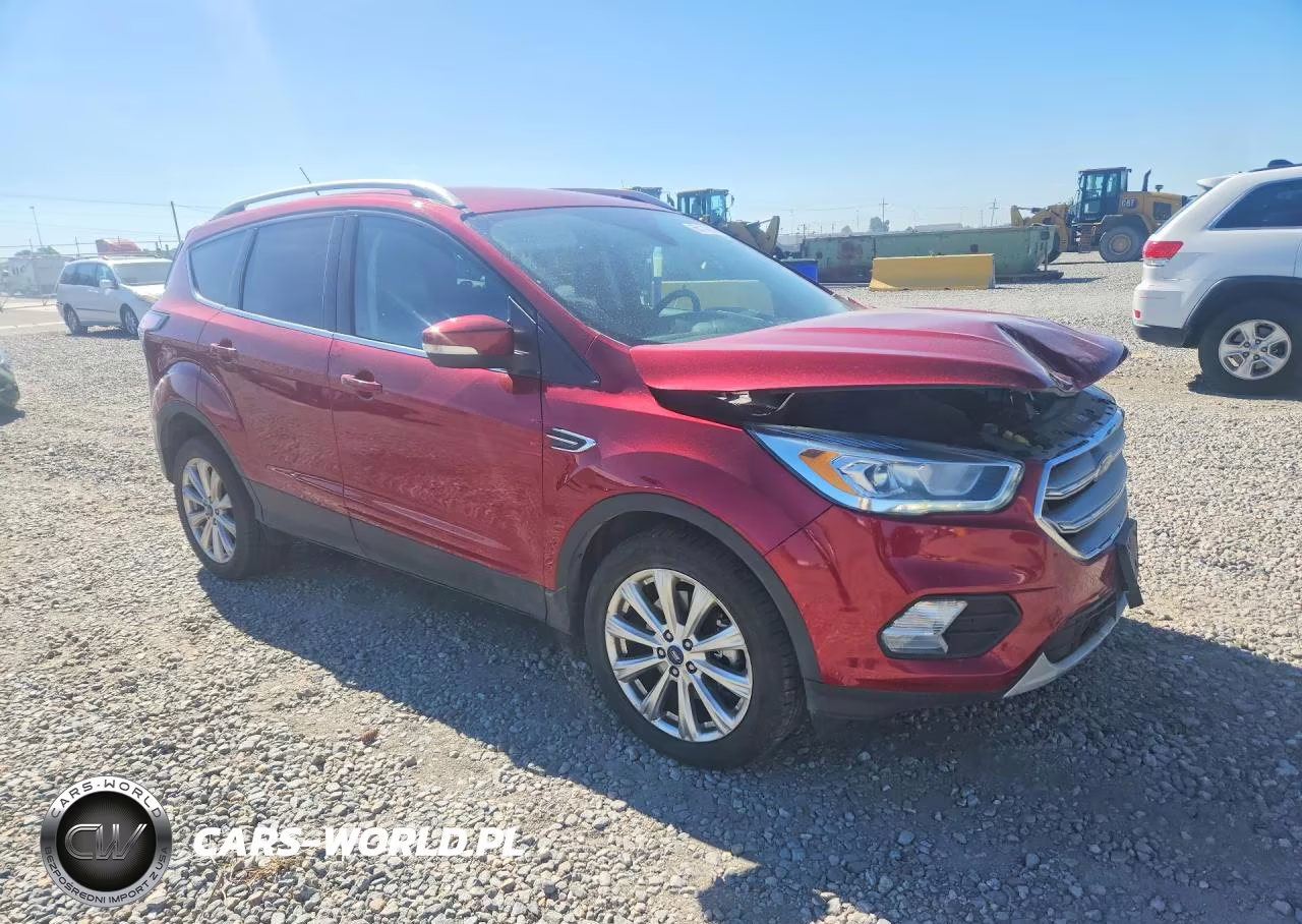 2017 Ford Escape Titanium VIN:1FMCU9J97HUD53659 - 4
