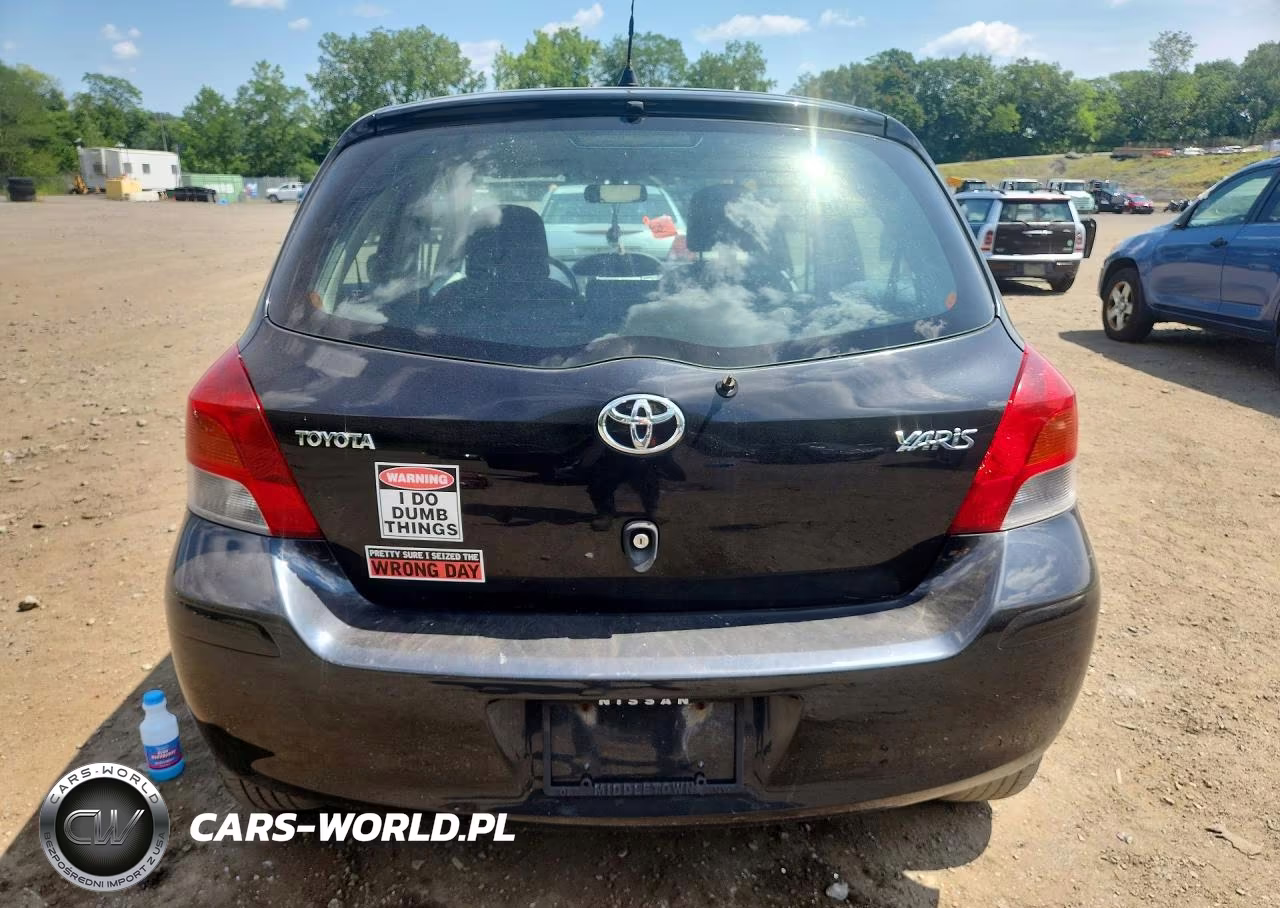2009 Toyota Yaris Base VIN:JTDKT903495258052 - 6