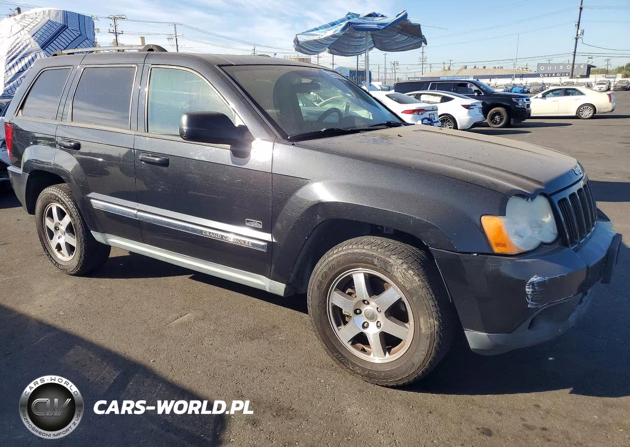 2009 Jeep Grand Cherokee Laredo VIN:1J8GR48K19C548949 - 4