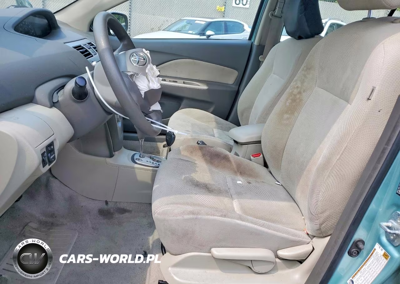 2009 Toyota Yaris Base VIN:JTDBT903994047452 - 7