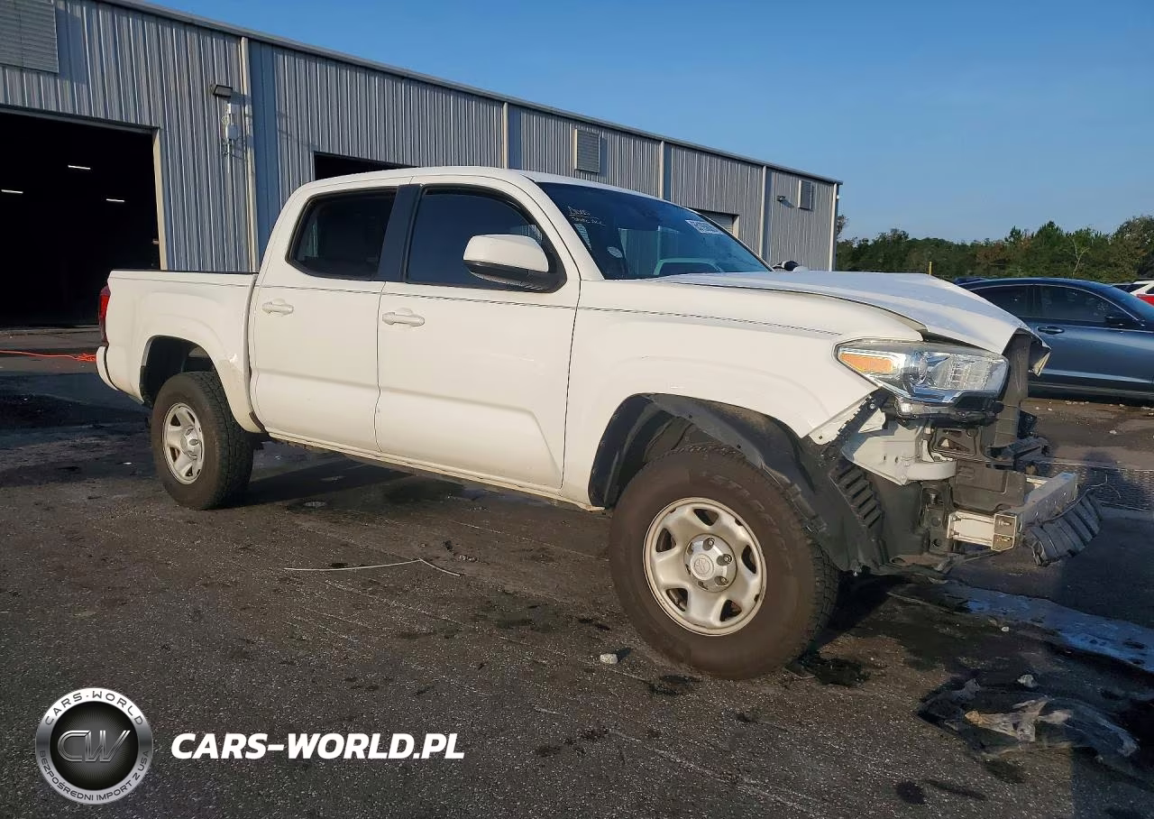 2018 Toyota Tacoma Sr VIN:5TFAX5GN0JX130559 - 4