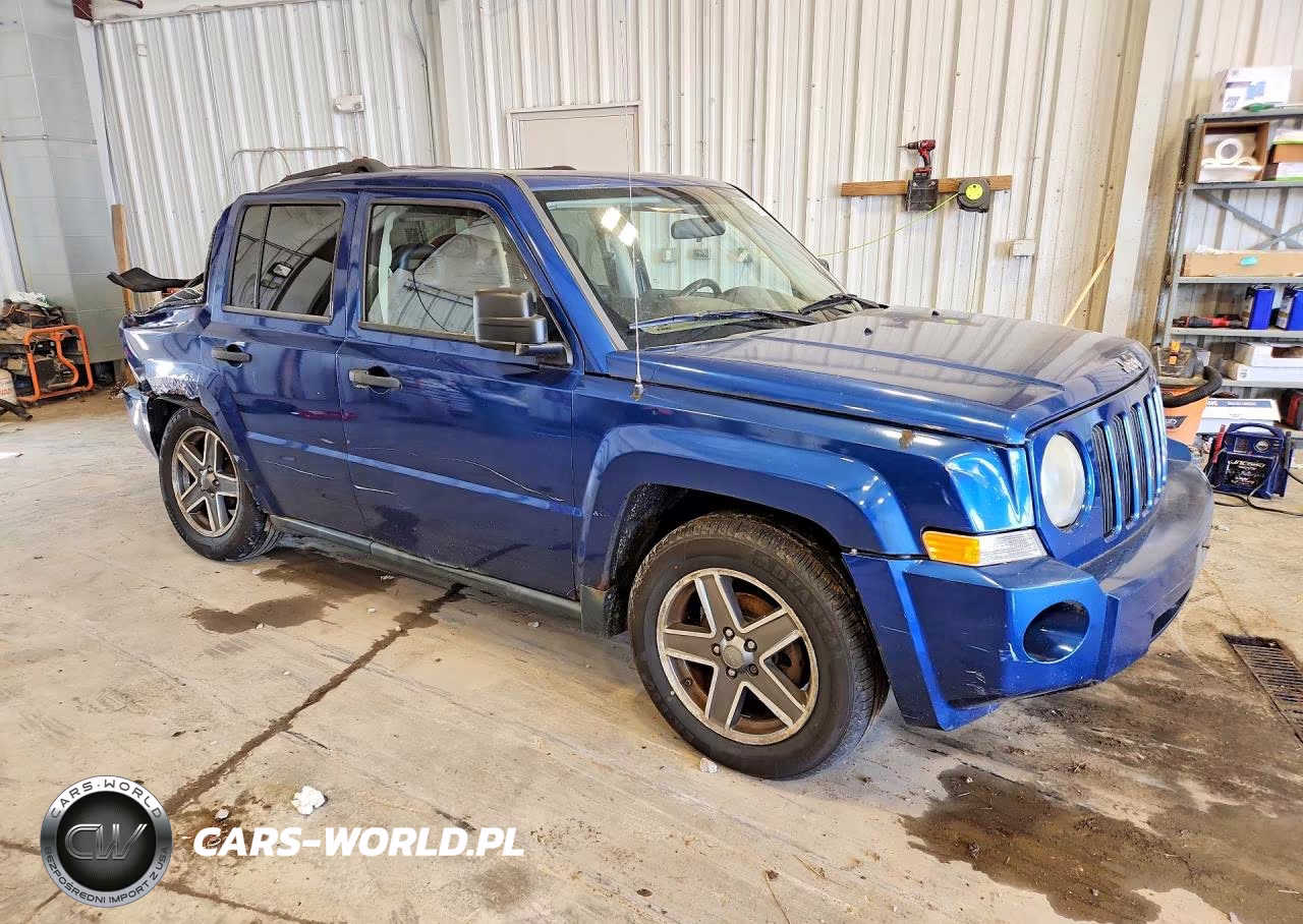 2009 Jeep Patriot Sport VIN:1J4FT28B39D155001 - 4
