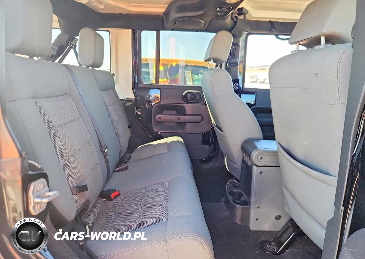 2009 Jeep Wrangler Unlimited Sahara VIN:1J4GA59109L769608 - 11