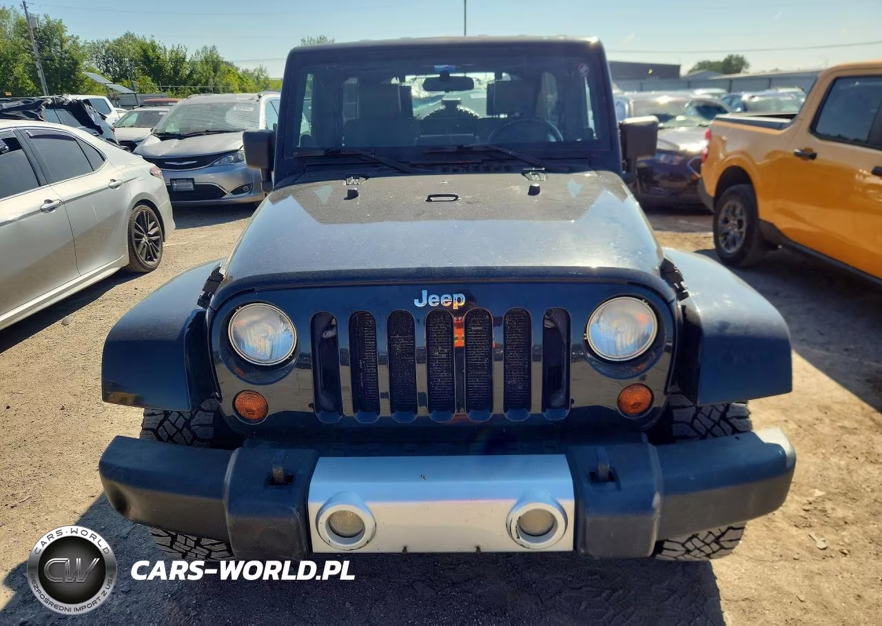 2009 Jeep Wrangler Unlimited Sahara VIN:1J4GA59109L769608 - 5