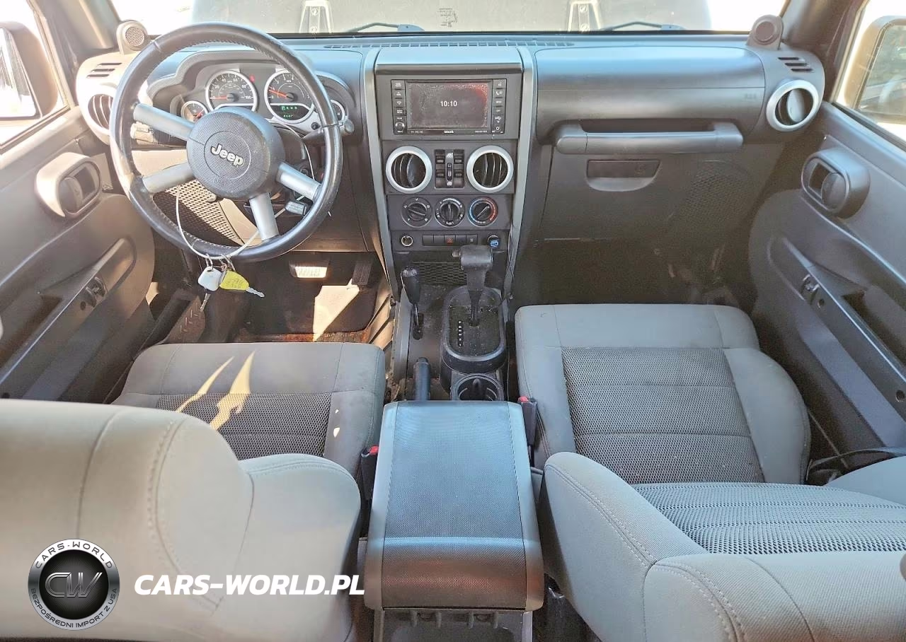 2009 Jeep Wrangler Unlimited Sahara VIN:1J4GA59109L769608 - 8