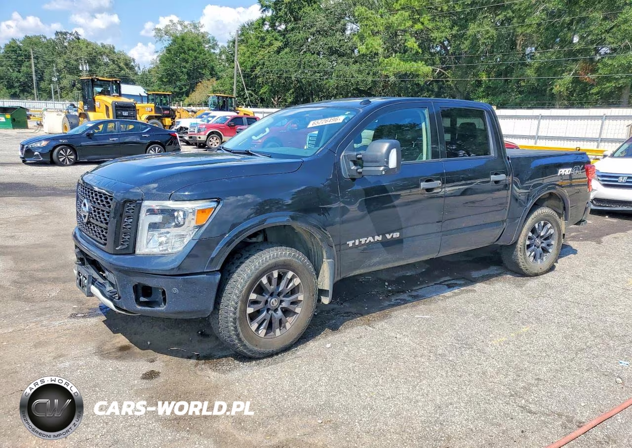 2018 Nissan Titan Pro-4X VIN:1N6AA1E5XJN511924 - 1