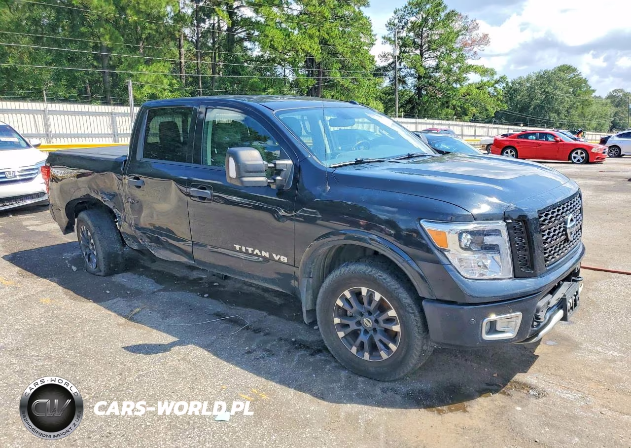 2018 Nissan Titan Pro-4X VIN:1N6AA1E5XJN511924 - 4