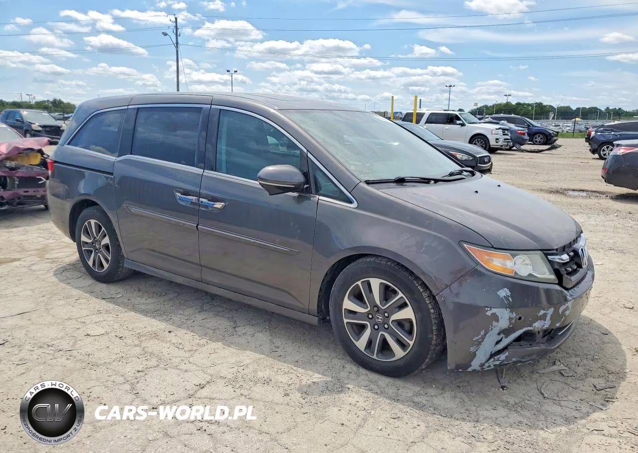2014 Honda Odyssey Touring VIN:5FNRL5H93EB070115 - 4