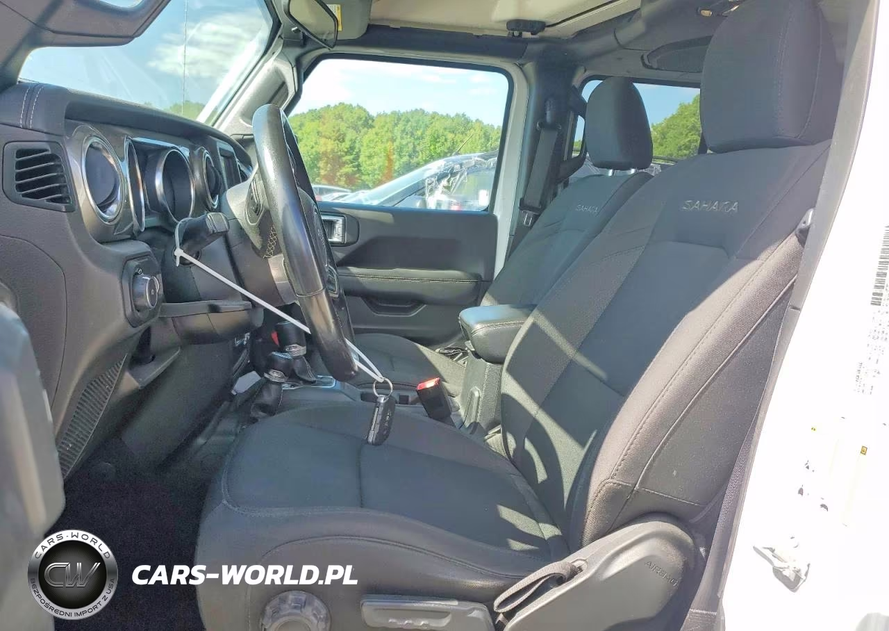 2019 Jeep Wrangler Unlimited Sahara VIN:1C4HJXENXKW635868 - 7