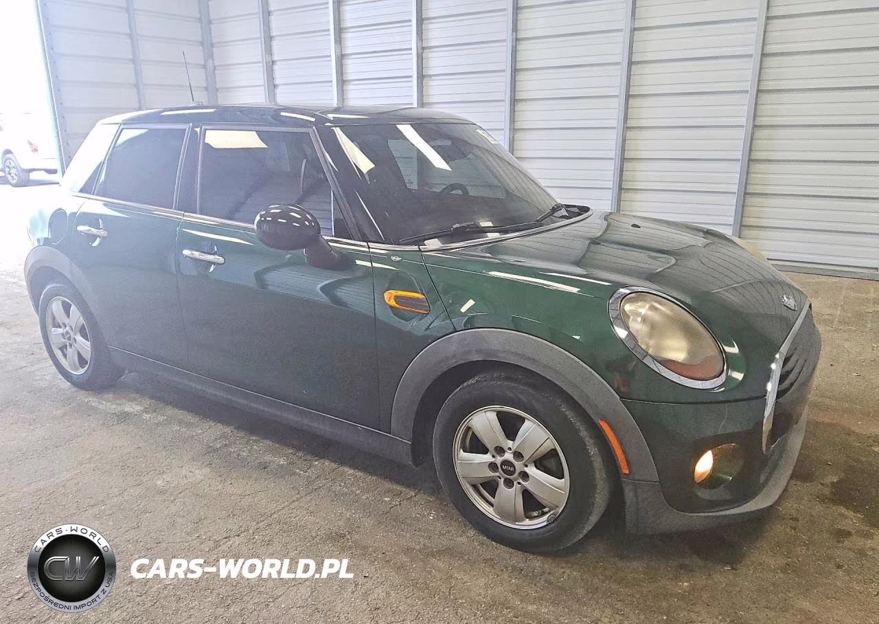 2015 Mini Cooper VIN:WMWXS5C53FT829646 - 4