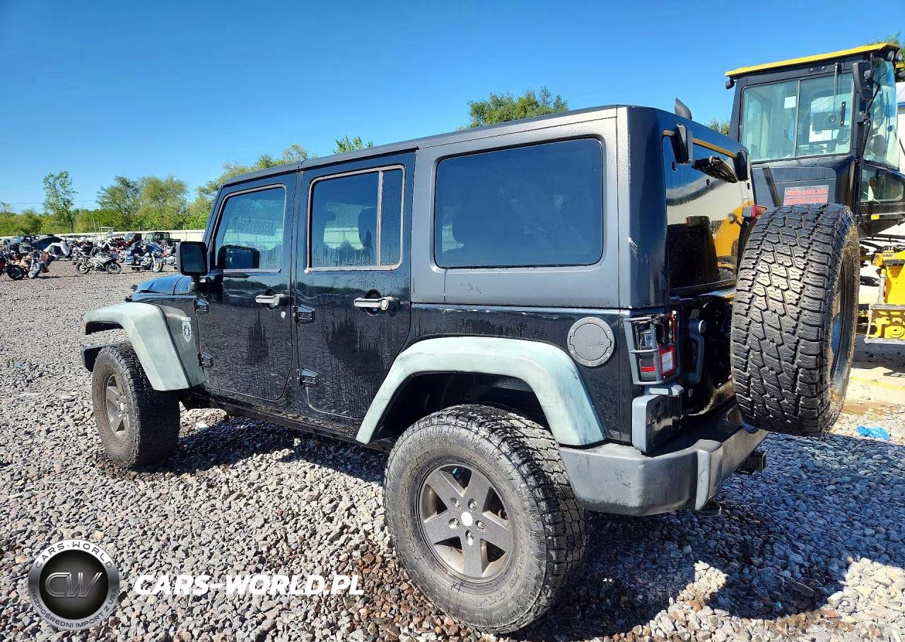 2011 Jeep Wrangler Unlimited Rubicon VIN:1J4BA6H17BL593471 - 2