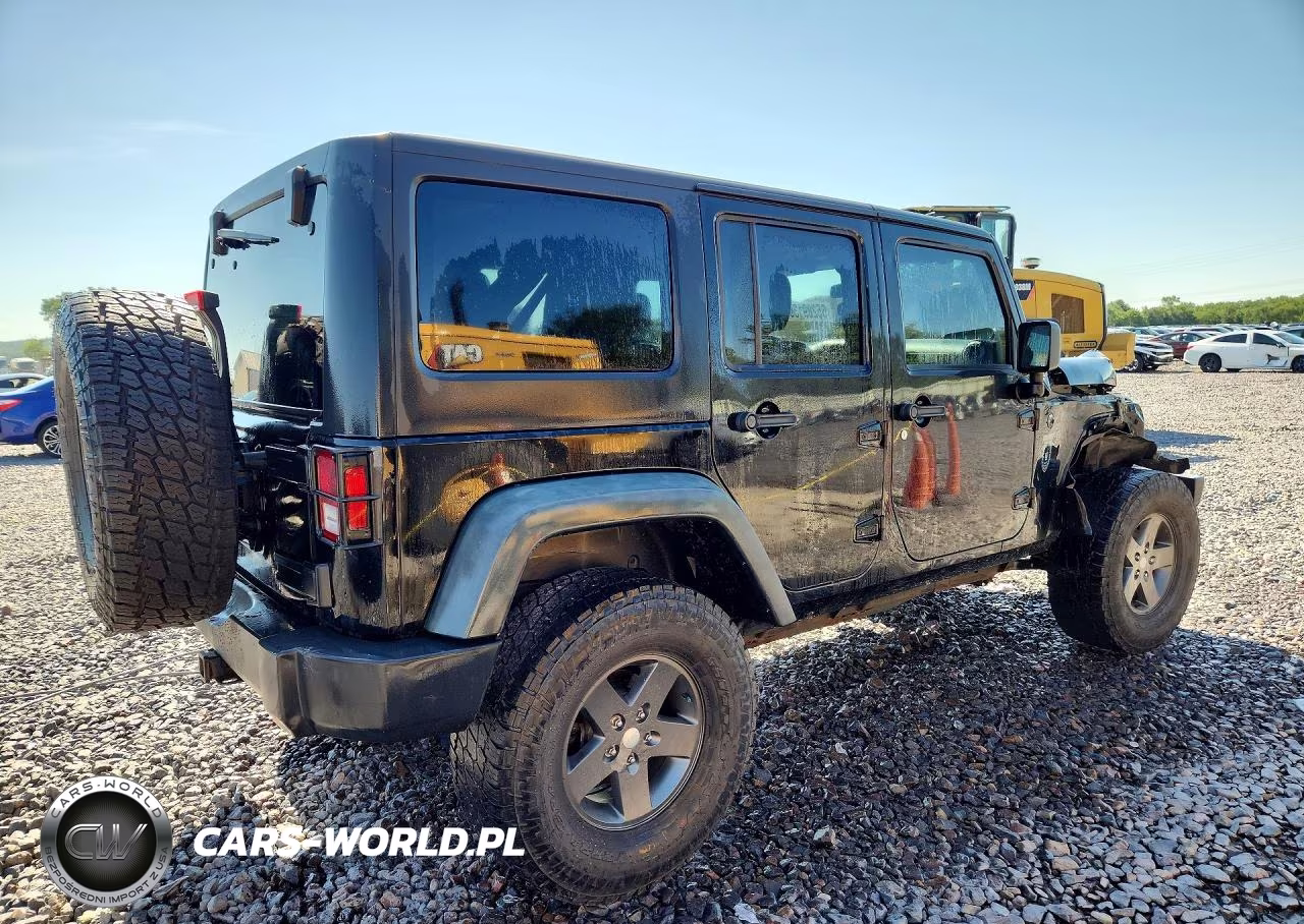 2011 Jeep Wrangler Unlimited Rubicon VIN:1J4BA6H17BL593471 - 3