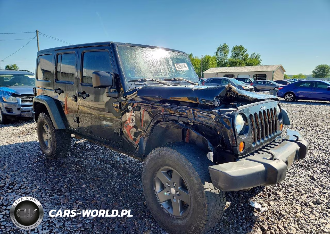 2011 Jeep Wrangler Unlimited Rubicon VIN:1J4BA6H17BL593471 - 4