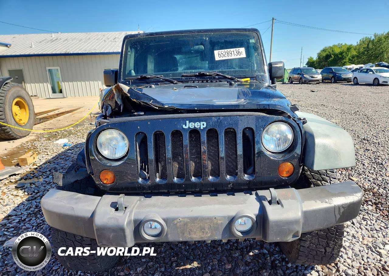 2011 Jeep Wrangler Unlimited Rubicon VIN:1J4BA6H17BL593471 - 5