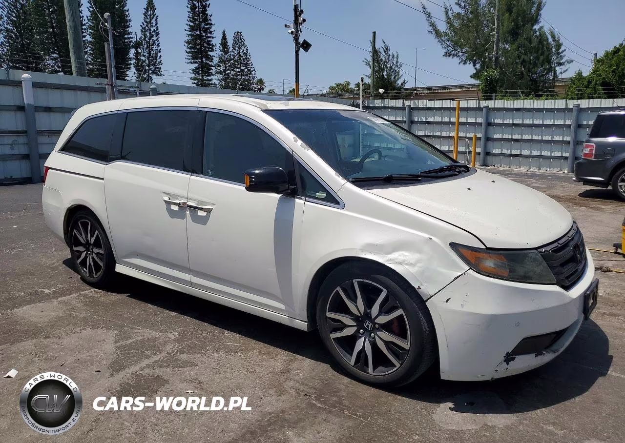 2012 Honda Odyssey Touring VIN:5FNRL5H90CB143275 - 4