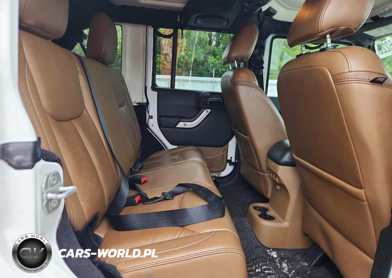 2014 Jeep Wrangler Unlimited Sahara VIN:1C4HJWEG7EL128024 - 11