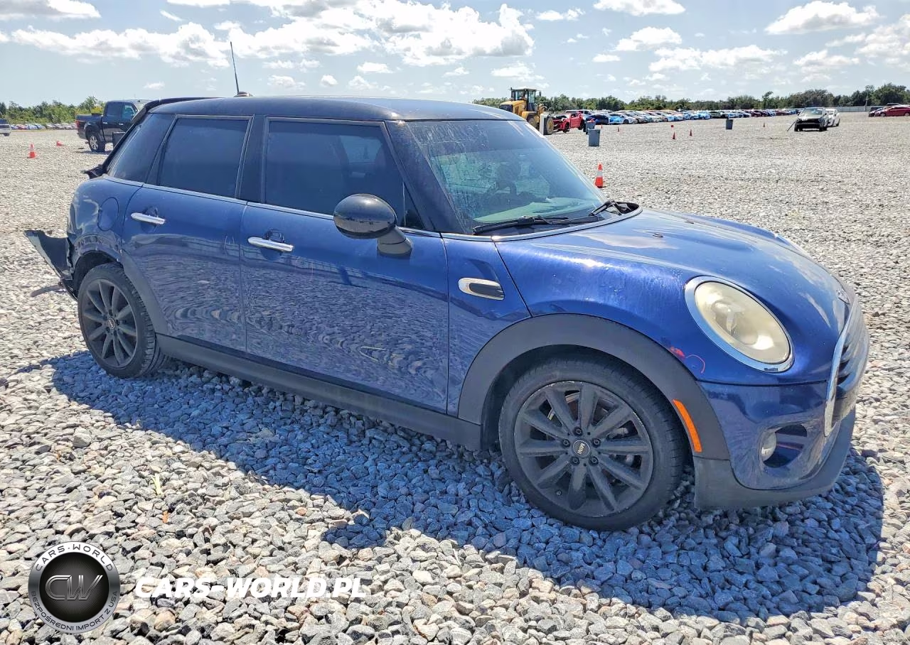 2017 Mini Cooper VIN:WMWXU1C32H2F77109 - 4