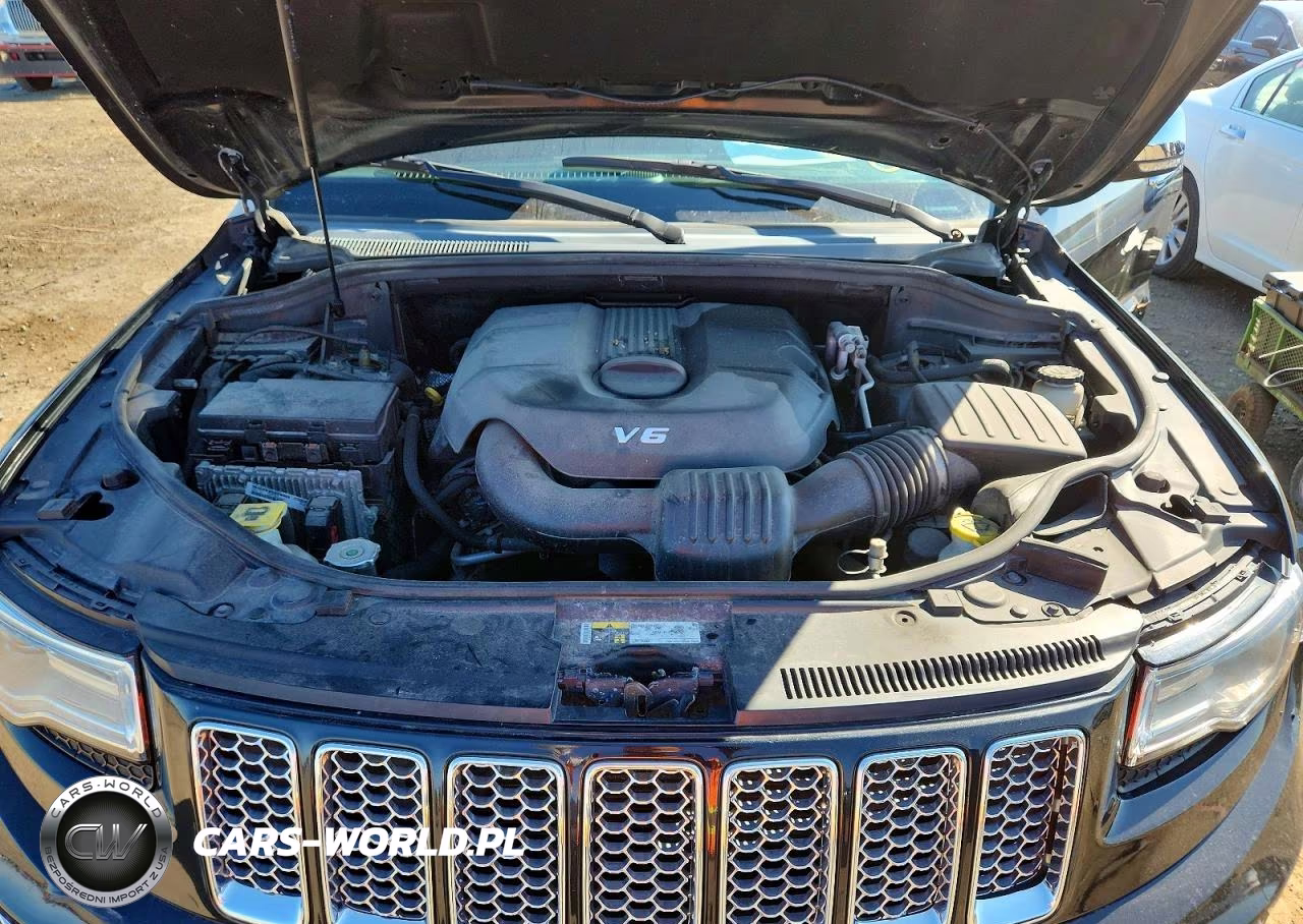 2015 Jeep Grand Cherokee Summit VIN:1C4RJFJG9FC856035 - 12