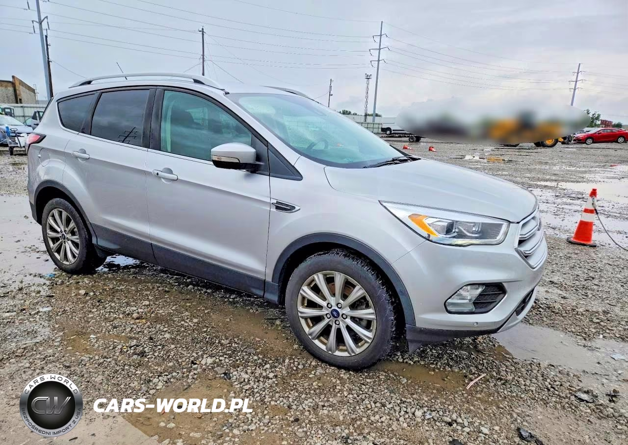 2018 Ford Escape Titanium VIN:1FMCU0J99JUC03442 - 4