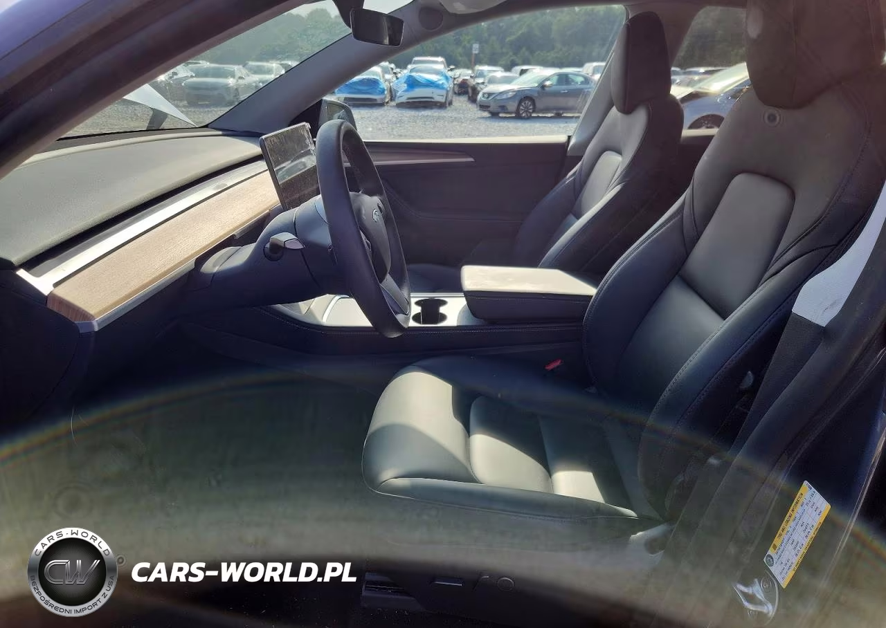 2023 Tesla Model Y VIN:7SAYGDEE6PA211659 - 7