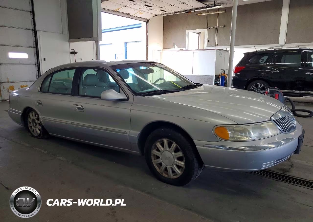 2000 Lincoln Continental VIN:1LNHM97VXYY785682 - 4