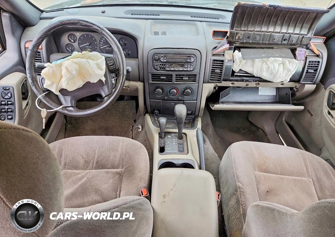 1999 Jeep Grand Cherokee Laredo VIN:1J4GW58N4XC804735 - 8