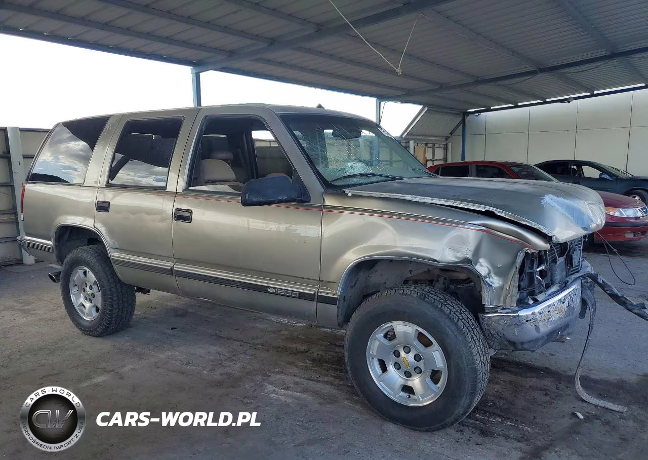1999 Chevrolet Tahoe K1500 VIN:1GNEK13R3XR144994 - 4