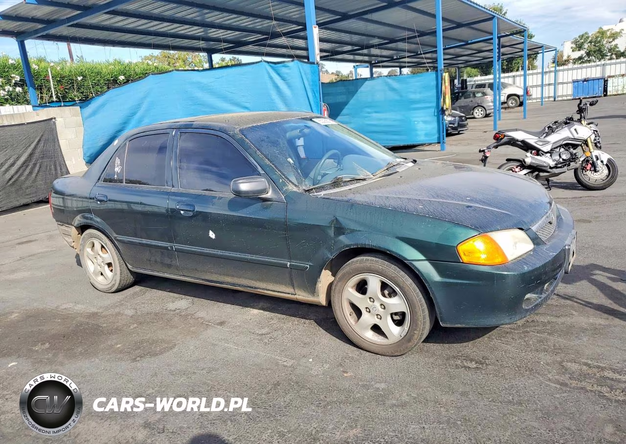 2000 Mazda Protege Es VIN:JM1BJ2238Y0239347 - 4