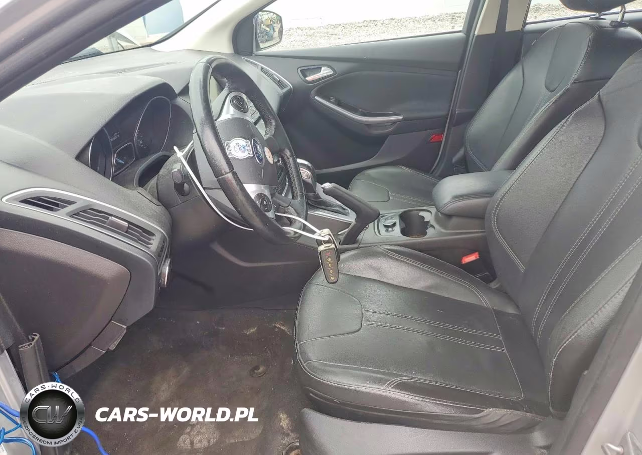 2014 Ford Focus Titanium VIN:1FADP3N21EL245085 - 7