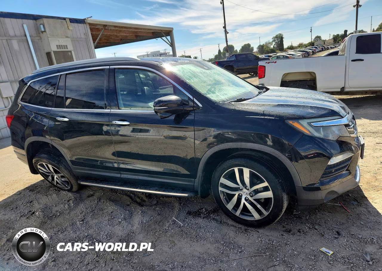 2016 Honda Pilot Touring VIN:5FNYF5H92GB011384 - 4