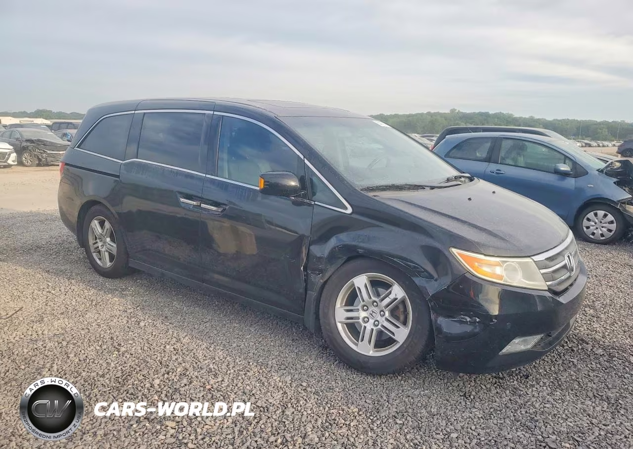 2012 Honda Odyssey Touring VIN:5FNRL5H98CB064145 - 4