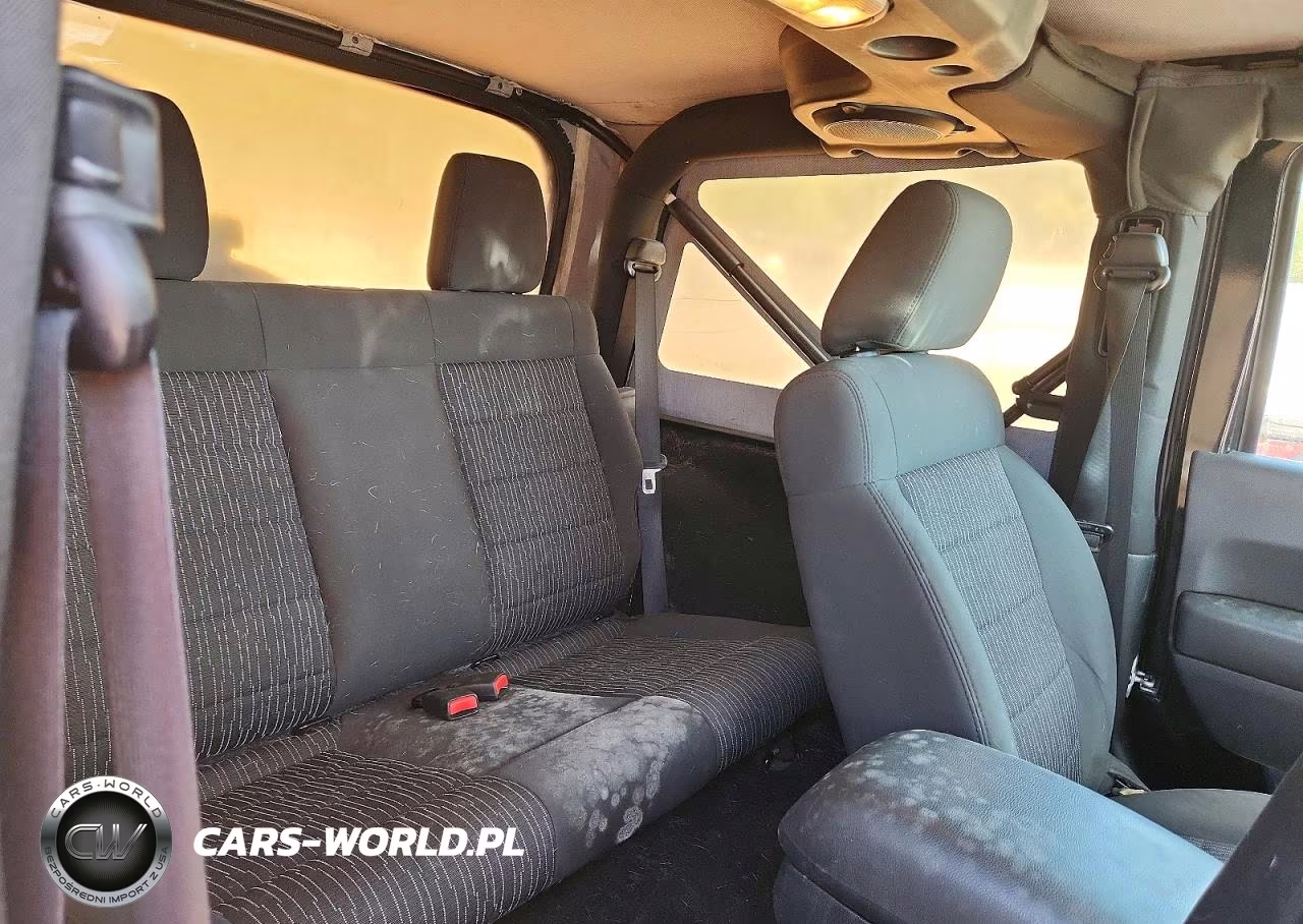 2011 Jeep Wrangler High Altitude VIN:1J4AA2D16BL501194 - 10