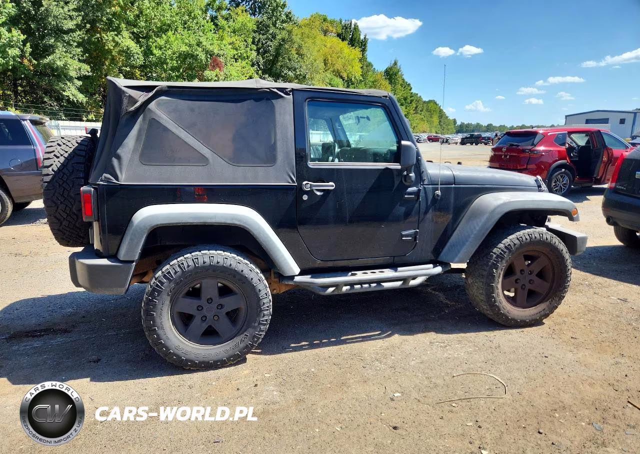 2011 Jeep Wrangler High Altitude VIN:1J4AA2D16BL501194 - 3
