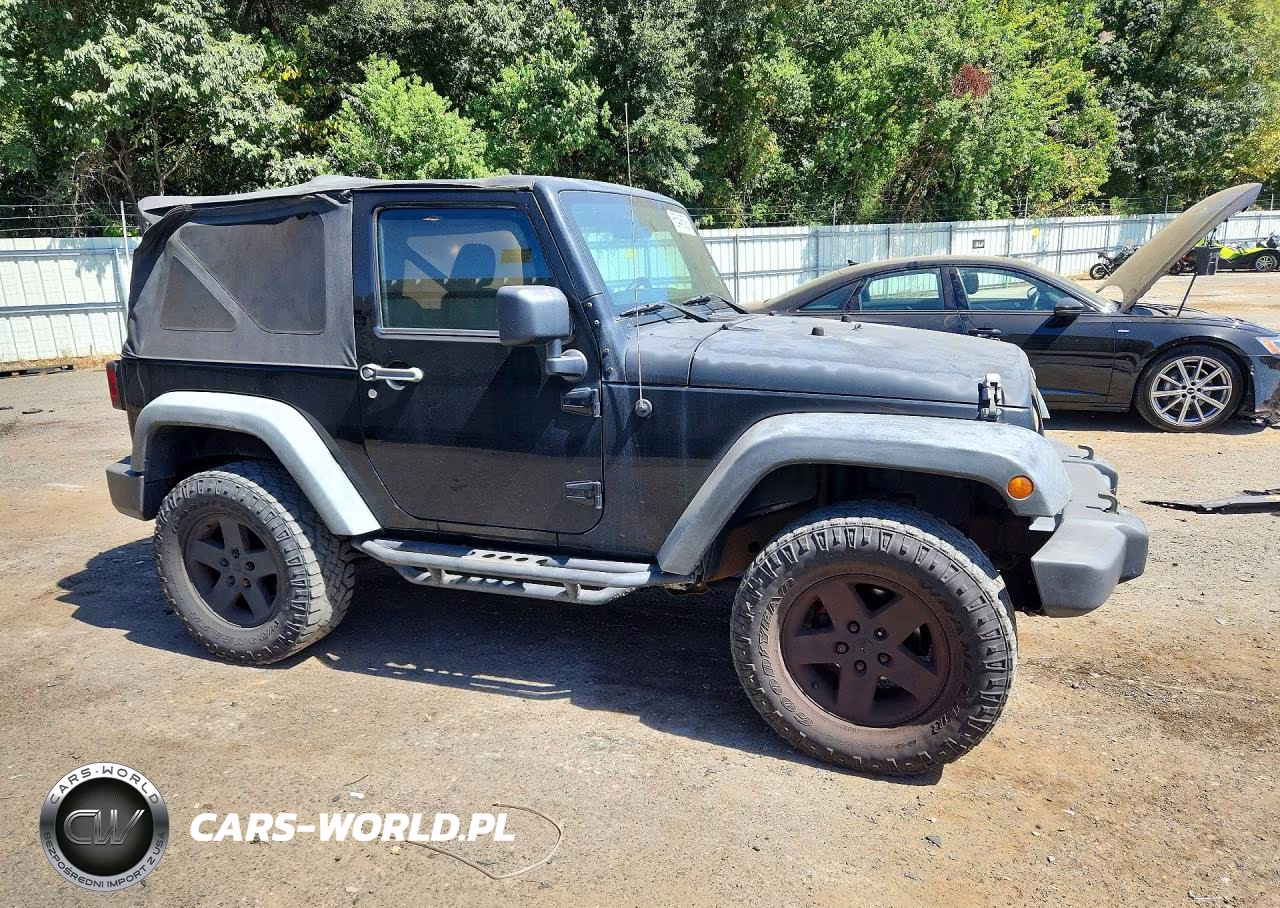 2011 Jeep Wrangler High Altitude VIN:1J4AA2D16BL501194 - 4