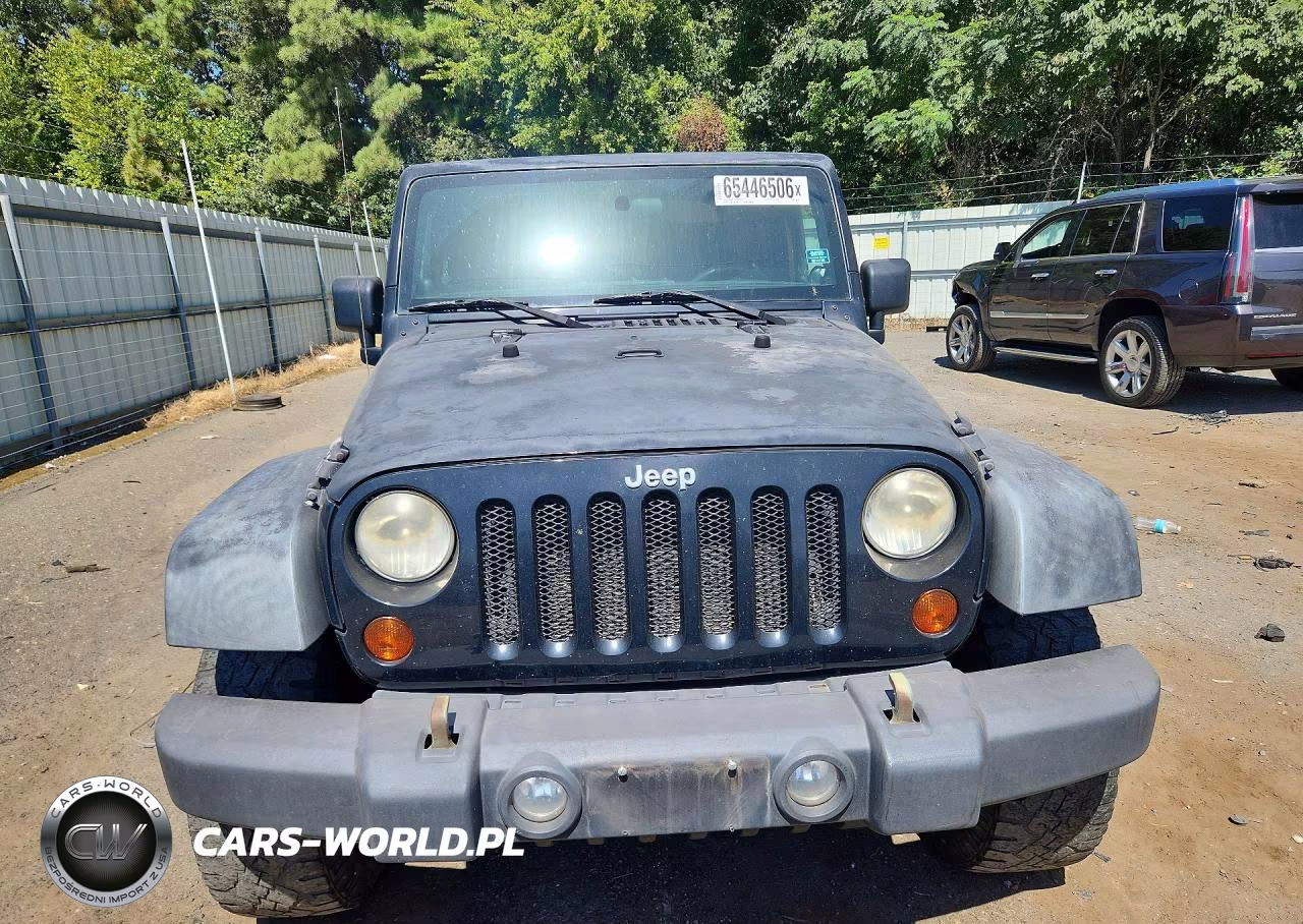 2011 Jeep Wrangler High Altitude VIN:1J4AA2D16BL501194 - 5