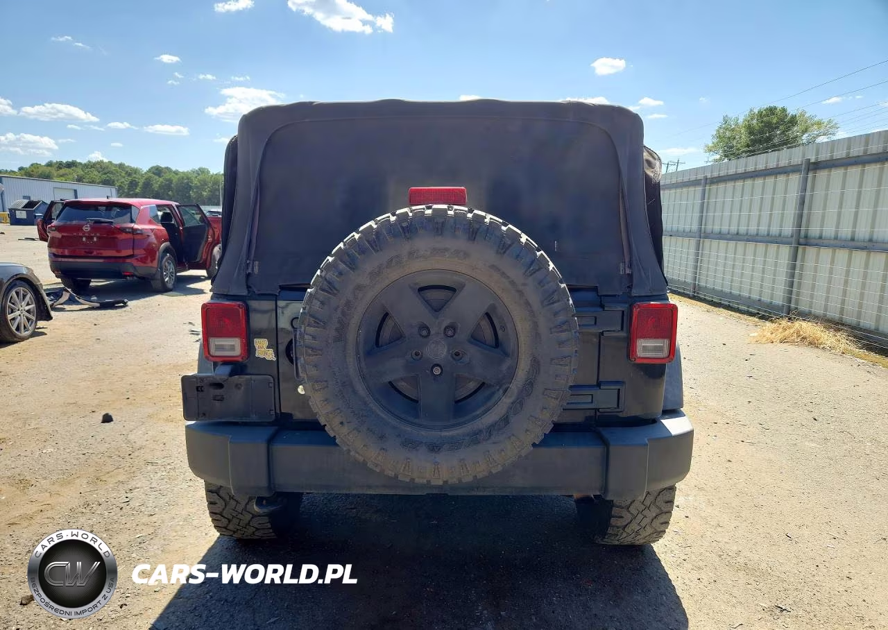 2011 Jeep Wrangler High Altitude VIN:1J4AA2D16BL501194 - 6