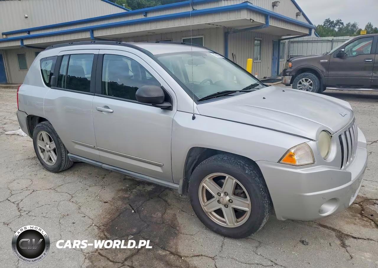 2010 Jeep Compass Sport VIN:1J4NT4FB6AD589704 - 4