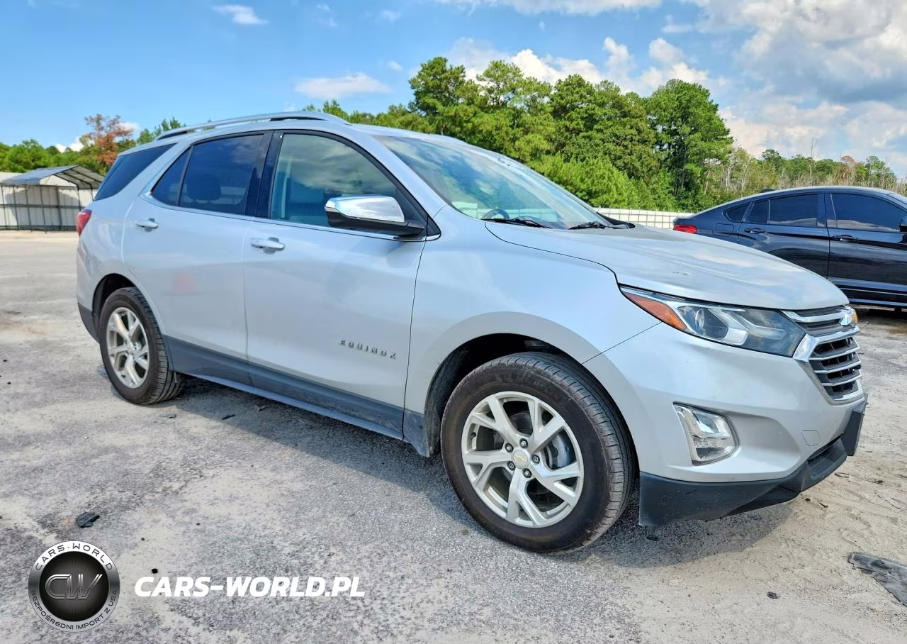 2018 Chevrolet Equinox Premier VIN:2GNAXVEV5J6328189 - 4