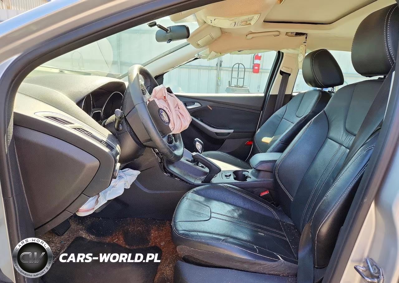 2014 Ford Focus Titanium VIN:1FADP3N24EL409932 - 7