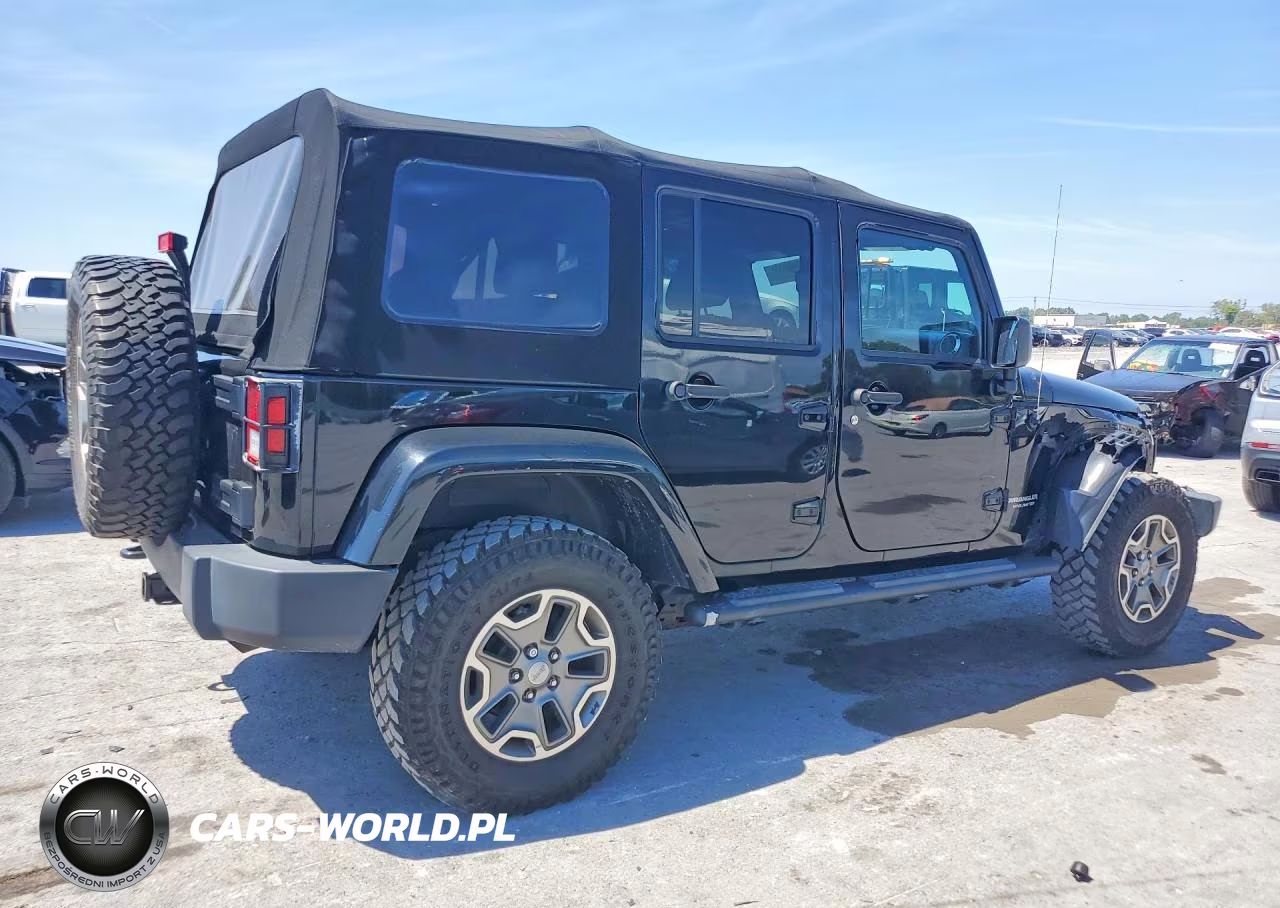 2014 Jeep Wrangler Unlimited Rubicon VIN:1C4HJWFG3EL314982 - 3